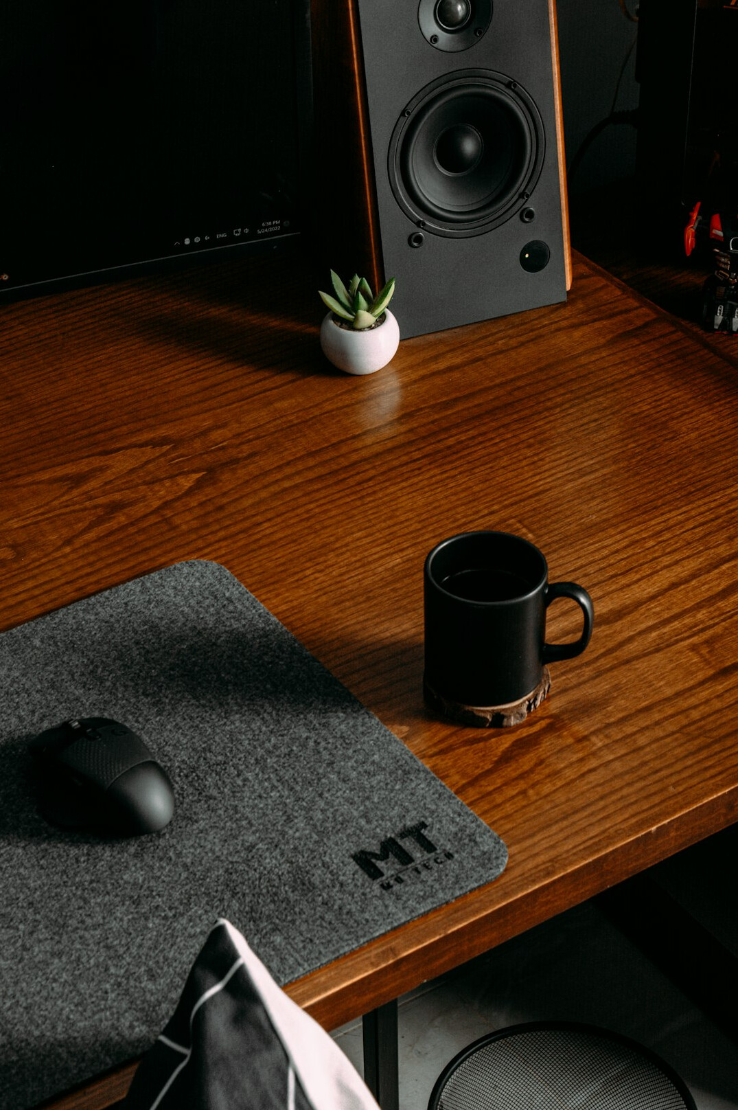 Laptop and coffee on a tidy developer desk