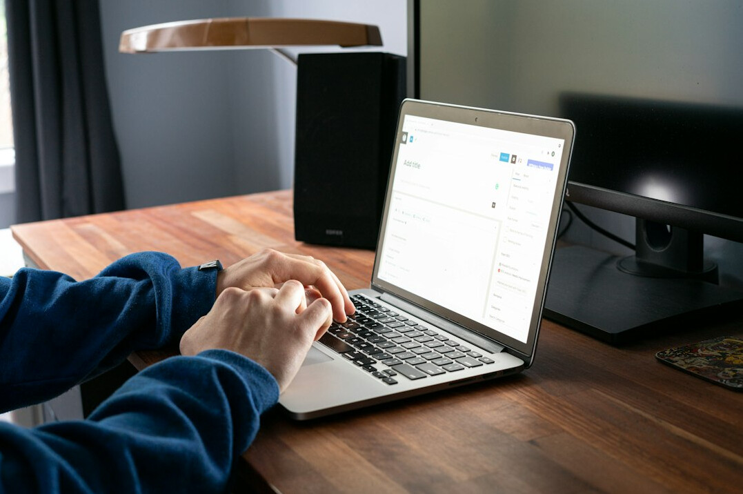 person learning programming on laptop